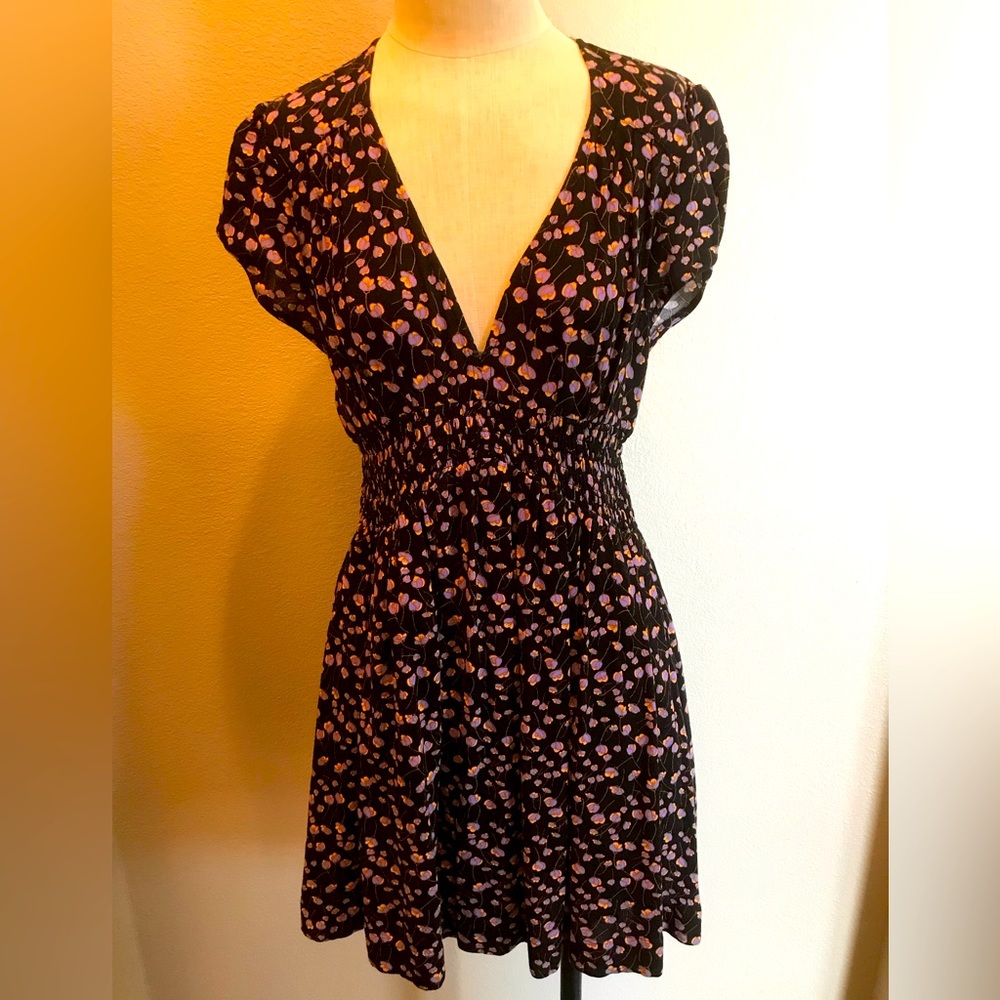 Free People soft and lightweight. 100% rayon.Short. Hidden side entry pocket